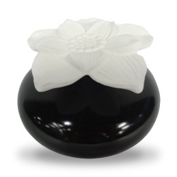 Diffuseur capillaire en céramique noire avec fleur en plâtre pour parfum d'ambiance